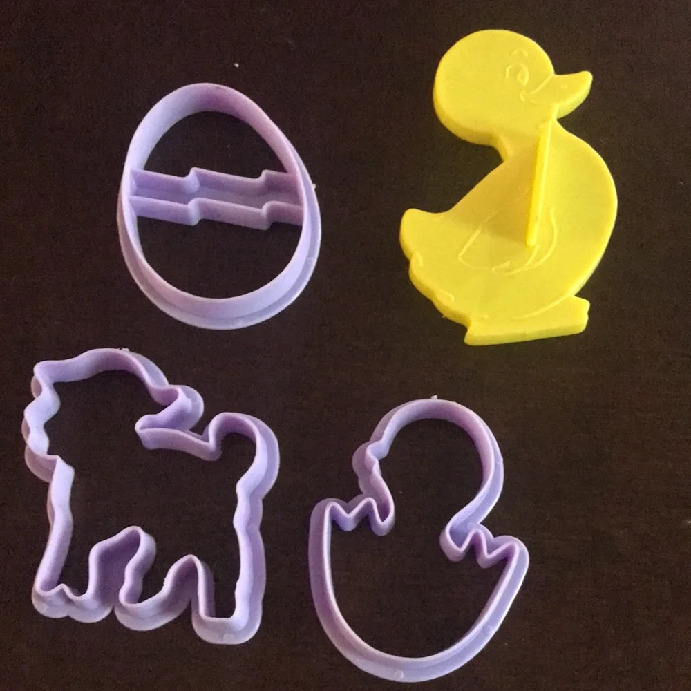 Four Plastic Easter Cookie Cutters Purple Egg Lamb Chick Hatching Yellow Duck